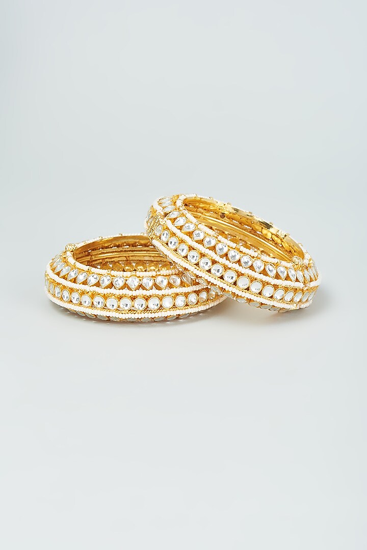 Gold Finish Kundan Polki & Pearl Bangles (Set of 2) by VASTRAA Jewellery at Pernia's Pop Up Shop
