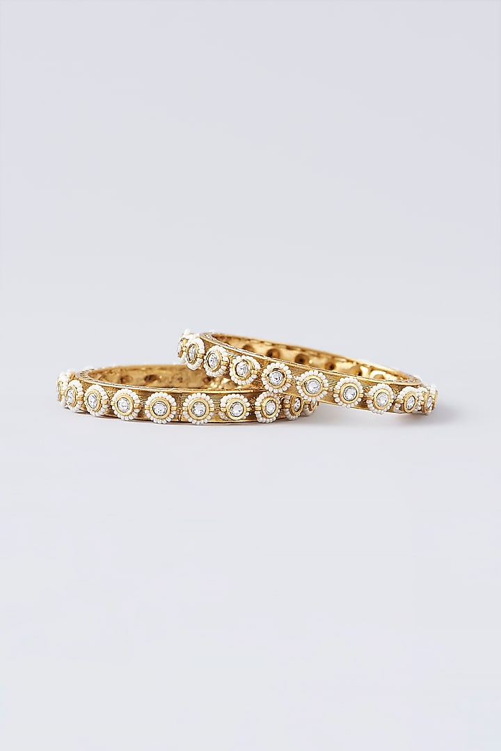 Gold Finish Pearl Bangles (Set Of 2) by VASTRAA Jewellery at Pernia's Pop Up Shop