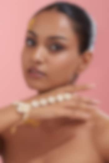 Gold Finish Kundan Polki & Pearl Haath Phool by VASTRAA Jewellery at Pernia's Pop Up Shop