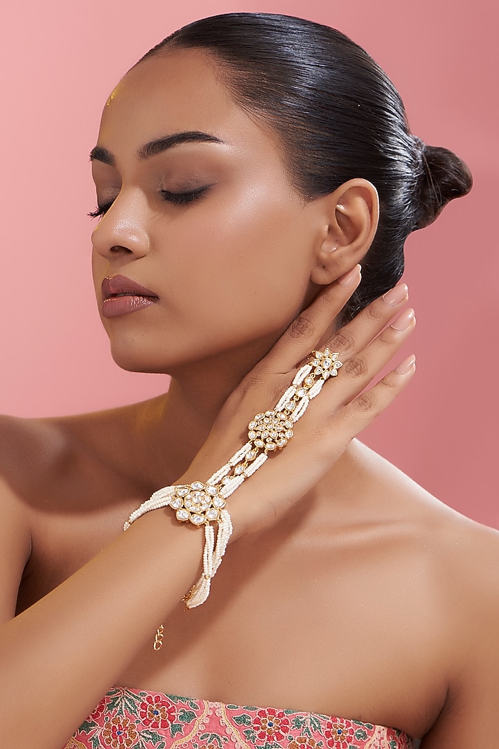 Gold Finish Kundan Polki Haath Phool by VASTRAA Jewellery at Pernia's Pop Up Shop