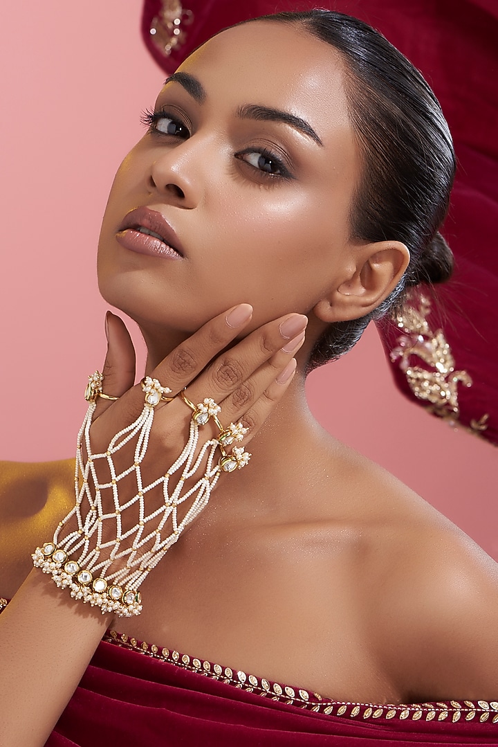 Gold Finish Kundan Polki & Pearl Haath Phool by VASTRAA Jewellery at Pernia's Pop Up Shop