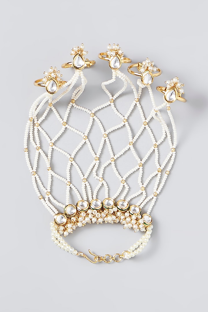 Gold Finish Kundan Polki & Pearl Haath Phool by VASTRAA Jewellery at Pernia's Pop Up Shop