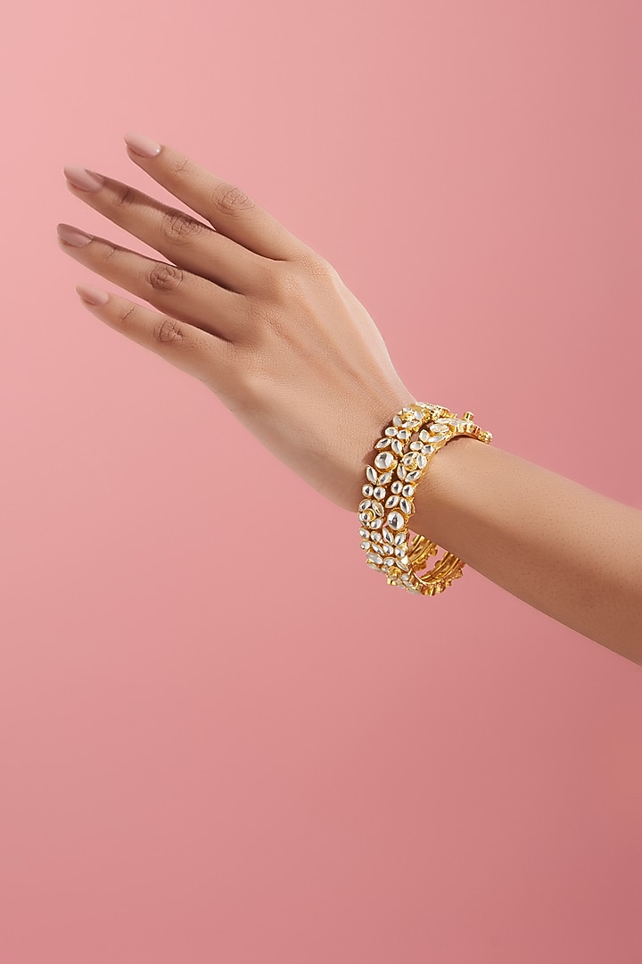 Gold Finish Kundan Polki Bangles (Set of 2) by VASTRAA Jewellery at Pernia's Pop Up Shop