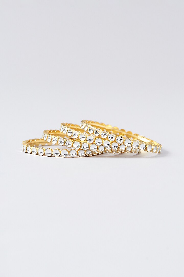Gold Finish Kundan Polki Bangles (Set of 4) by VASTRAA Jewellery at Pernia's Pop Up Shop