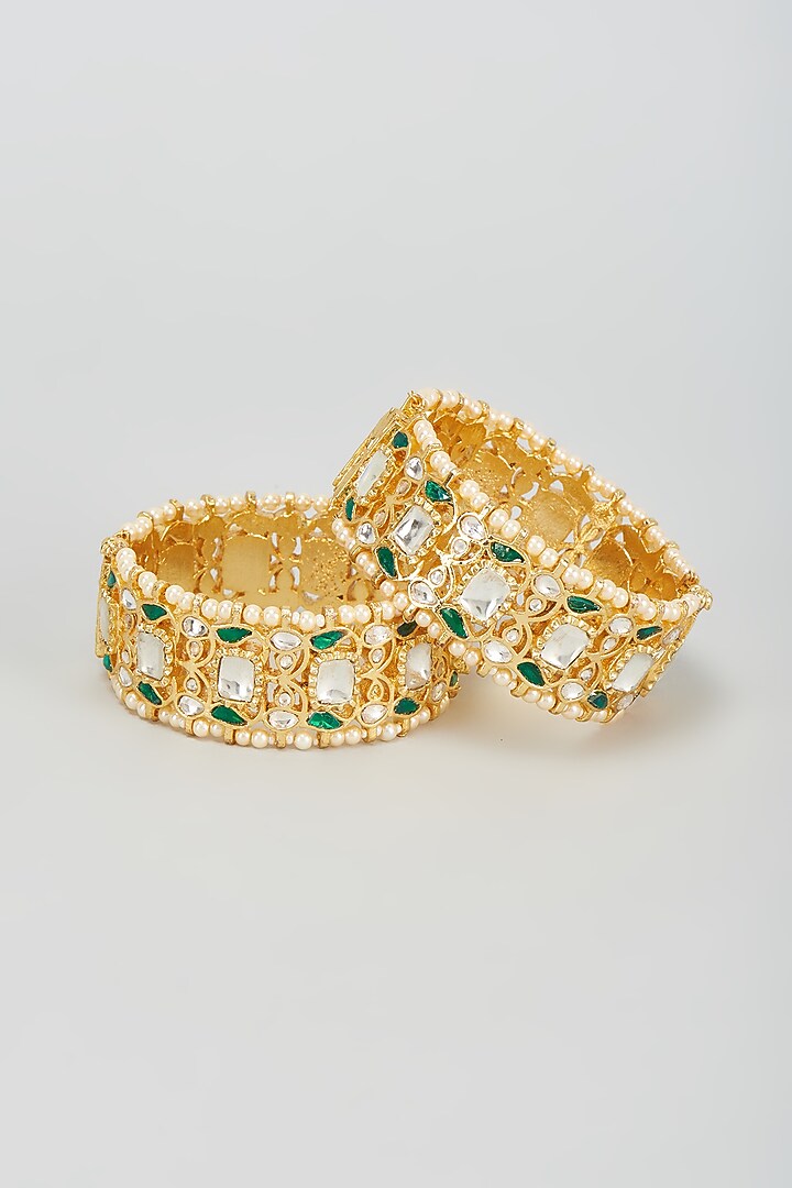 Gold Finish Kundan Polki & Green Stone Bangles (Set Of 2) by VASTRAA Jewellery at Pernia's Pop Up Shop