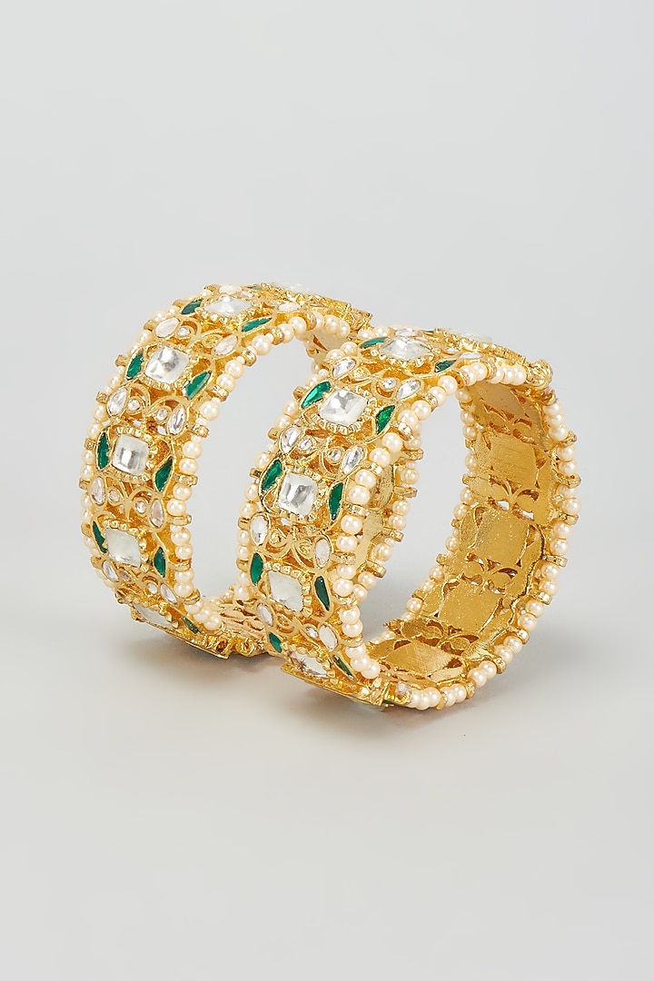 Gold Finish Kundan Polki & Green Stone Bangles (Set Of 2) by VASTRAA Jewellery at Pernia's Pop Up Shop