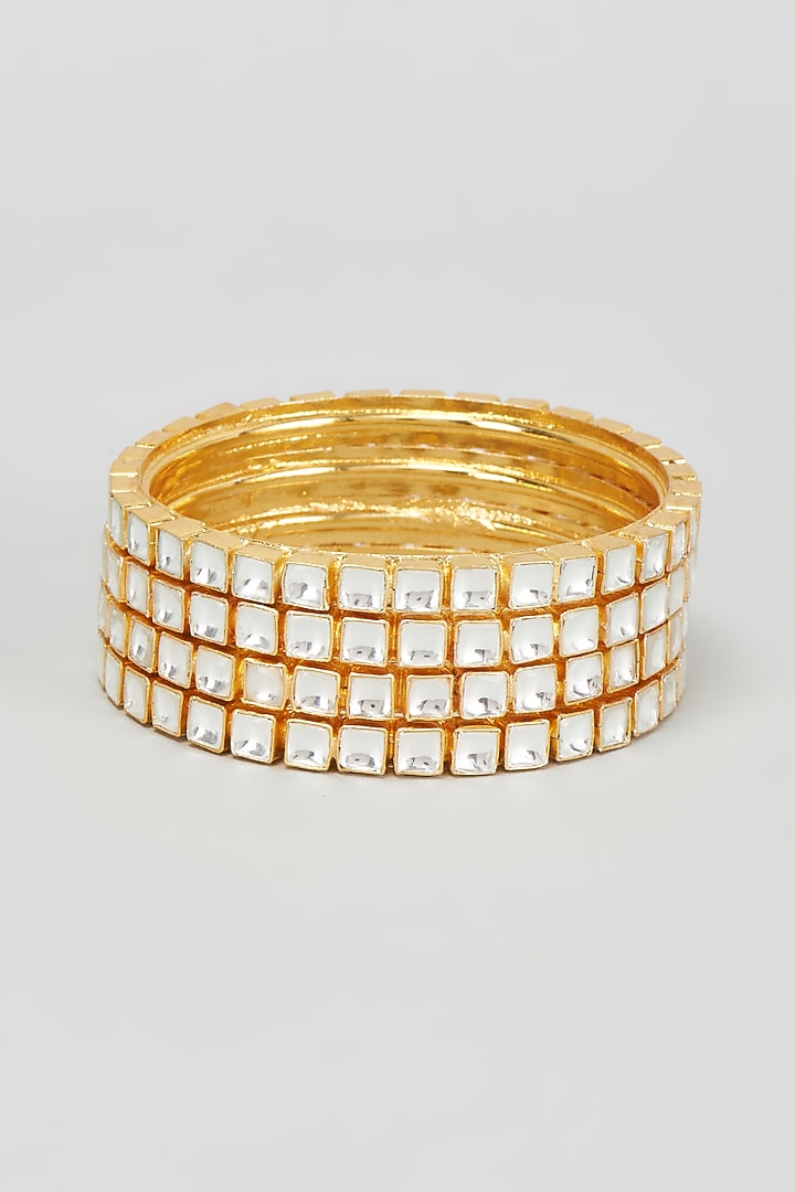 Gold Finish Kundan Polki Bangles (Set Of 4) by VASTRAA Jewellery at Pernia's Pop Up Shop