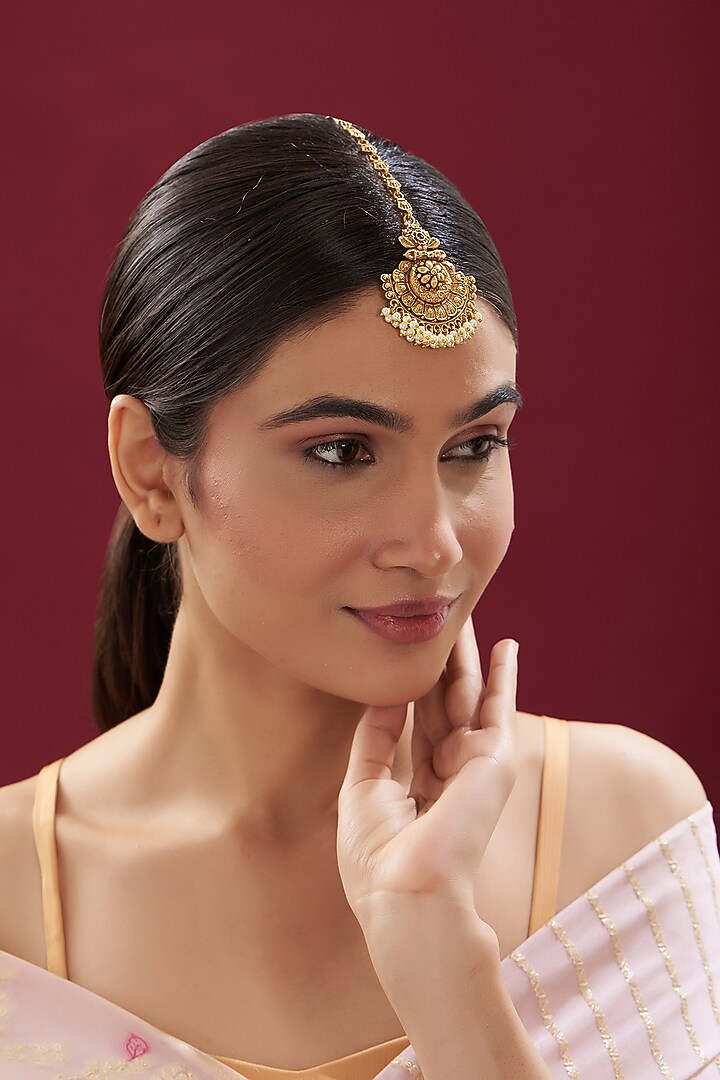 Gold Finish Pearl Temple Maangtikka by VASTRAA Jewellery at Pernia's Pop Up Shop