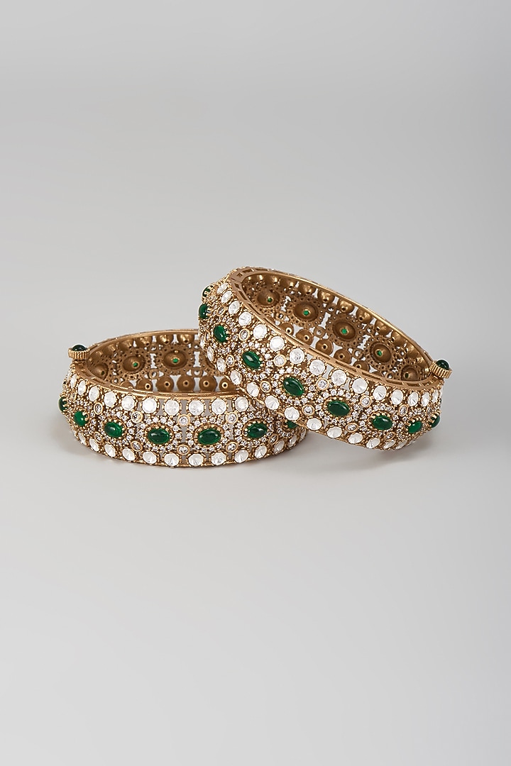 Gold Finish Kundan Polki & Emerald Stone Bangles (Set Of 2) by VASTRAA Jewellery at Pernia's Pop Up Shop