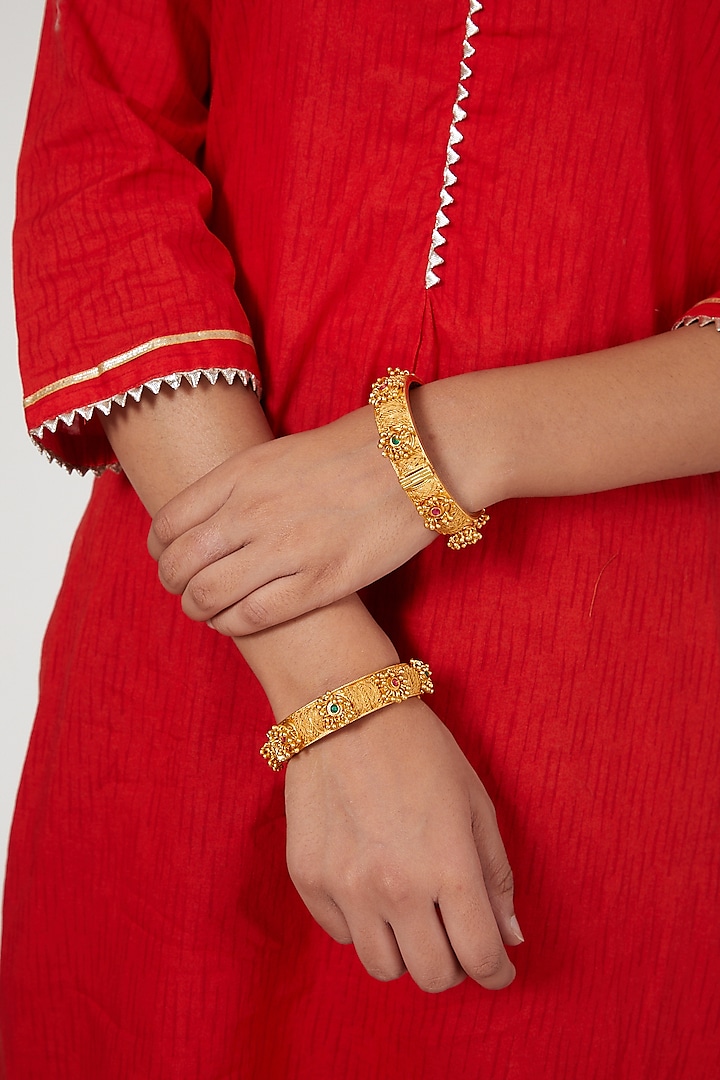 Gold Finish Red & Green Stone Bangles (Set of 2) by VASTRAA Jewellery at Pernia's Pop Up Shop