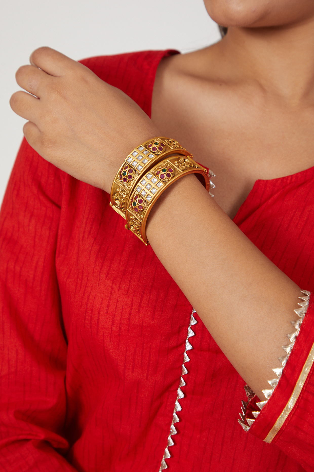 Gold Finish Temple Motif Openable Bangles (Set of 2) by VASTRAA Jewellery at Pernia's Pop Up Shop