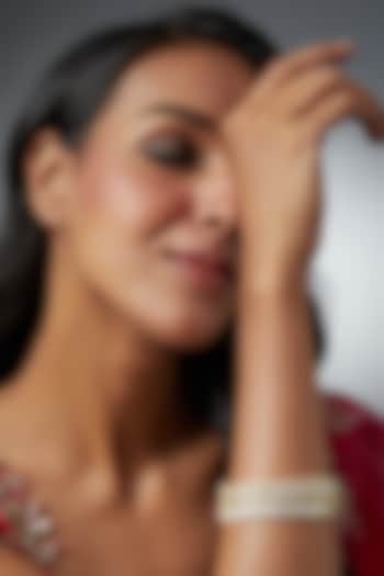 Gold Finish Kundan Polki Bangles (Set of 2) by VASTRAA Jewellery at Pernia's Pop Up Shop