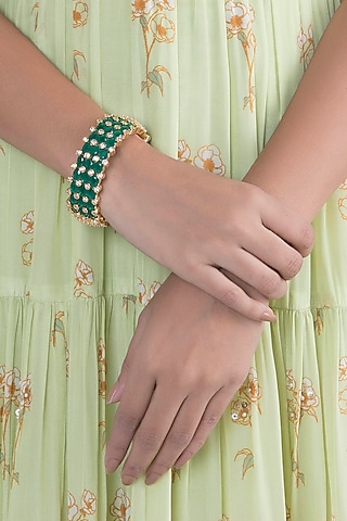 Gold Finish Zircon & Green Stone Bangle by VASTRAA Jewellery