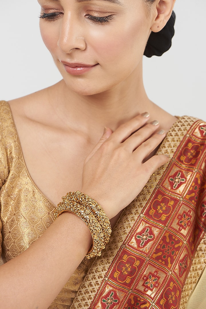 Gold Finish Temple Bangles (Set Of 2) by VASTRAA Jewellery at Pernia's Pop Up Shop
