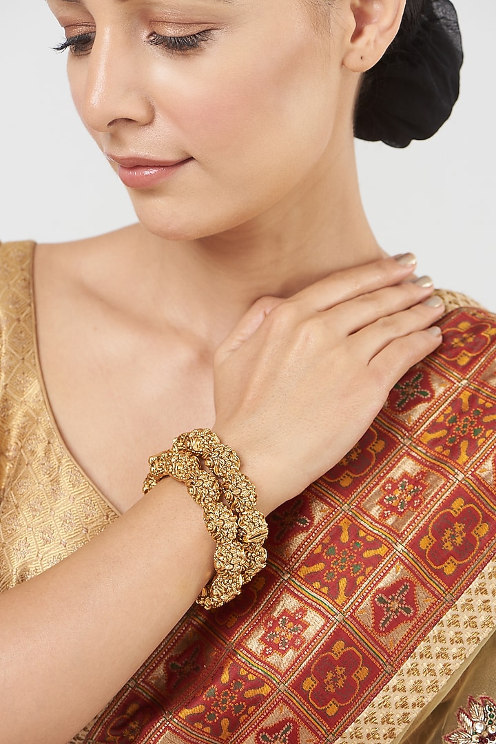 Gold Finish Temple Bangles (Set Of 2) by VASTRAA Jewellery at Pernia's Pop Up Shop