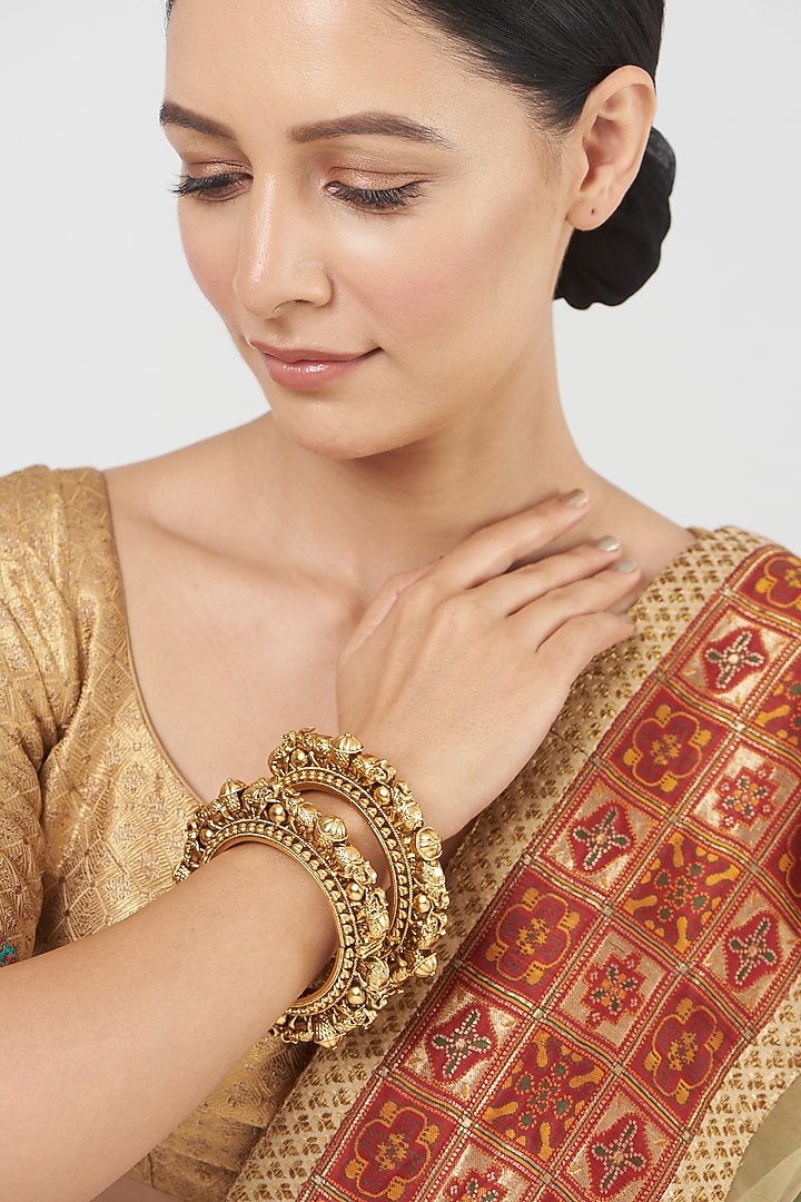 Gold Finish Temple Bangles (Set Of 2) by VASTRAA Jewellery at Pernia's Pop Up Shop