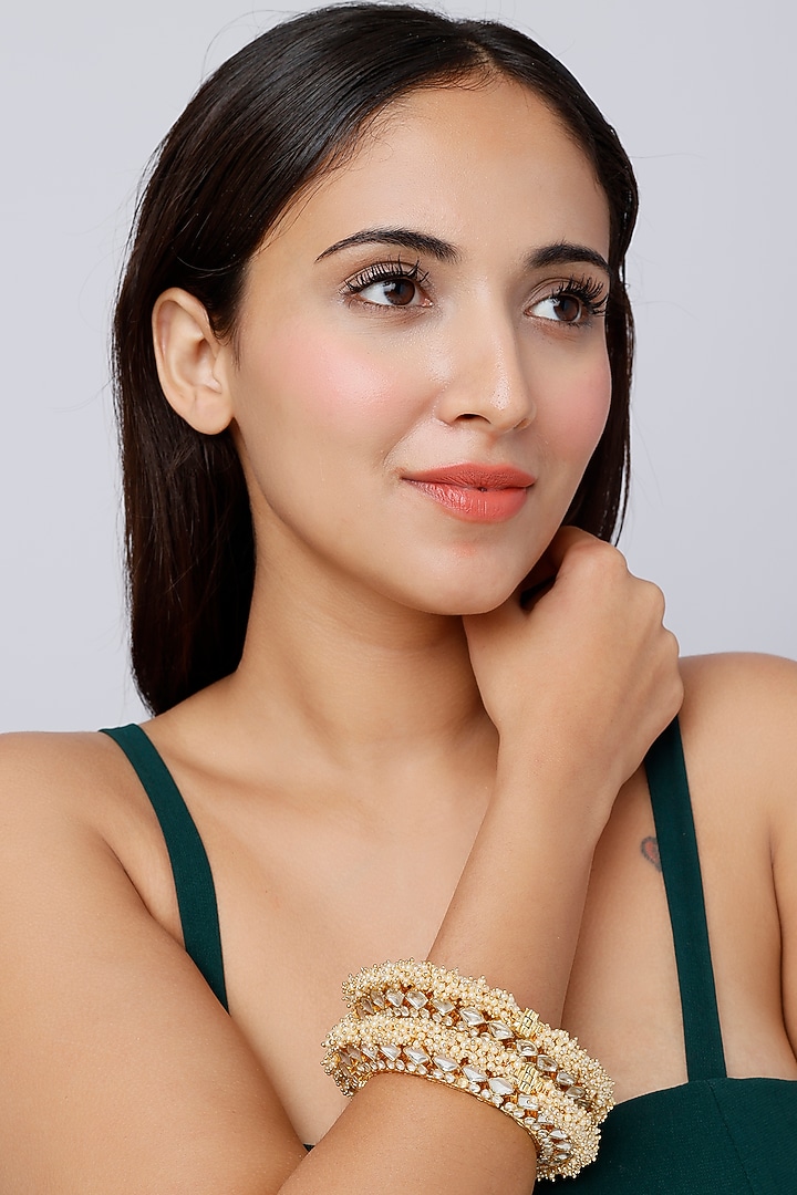 Gold Finish Peal Temple Bangles (Set Of 2) by VASTRAA Jewellery at Pernia's Pop Up Shop