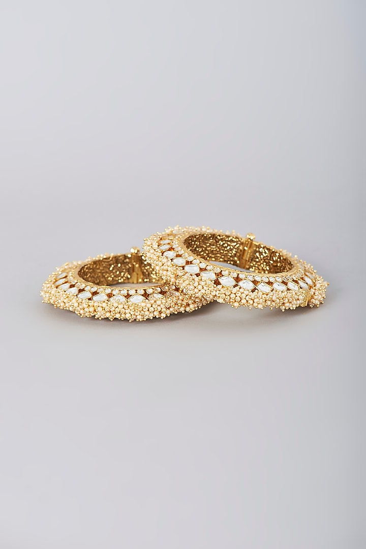 Gold Finish Peal Temple Bangles (Set Of 2) by VASTRAA Jewellery at Pernia's Pop Up Shop