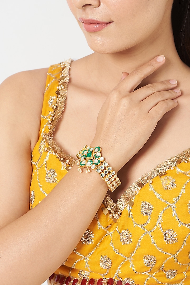 Gold Finish Pachi Kundan Polki & Green Stone Bracelet by VASTRAA Jewellery