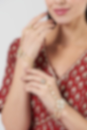 Gold Finish Kundan Polki Hathphool (Set Of 2) by VASTRAA Jewellery at Pernia's Pop Up Shop