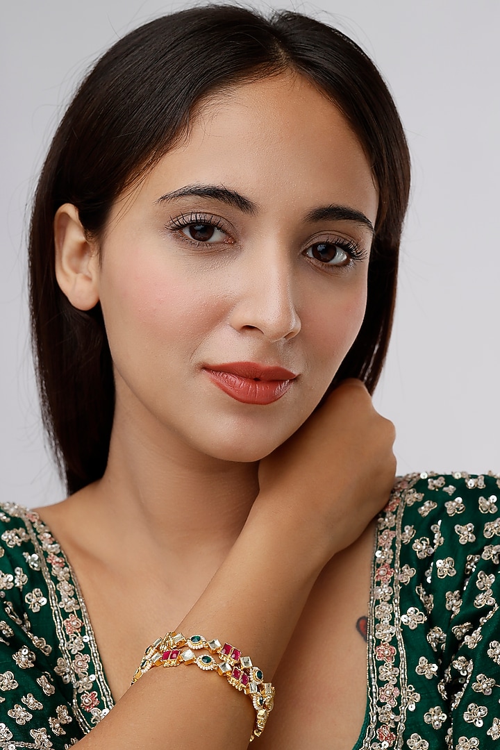Gold Finish Kundan Polki & Synthetic Stone Bangles (Set Of 2) by VASTRAA Jewellery at Pernia's Pop Up Shop