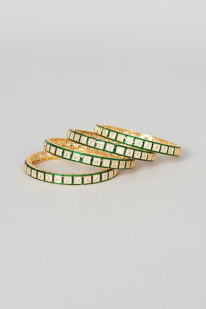 Gold Finish Kundan Polki Green Enameled Bangles (Set Of 4) by VASTRAA Jewellery at Pernia's Pop Up Shop