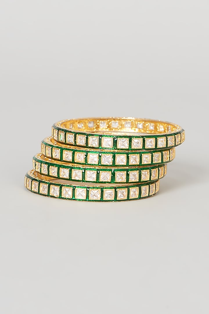 Gold Finish Kundan Polki Green Enameled Bangles (Set Of 4) by VASTRAA Jewellery at Pernia's Pop Up Shop