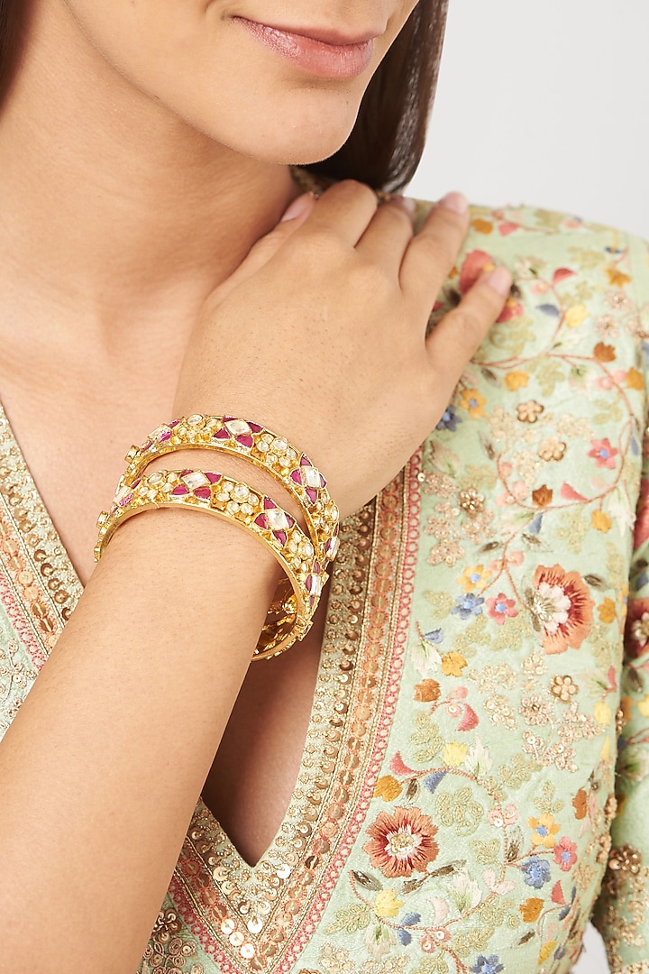 Gold Finish Pink Stone & Kundan Polki Bangles (Set Of 2) by VASTRAA Jewellery at Pernia's Pop Up Shop