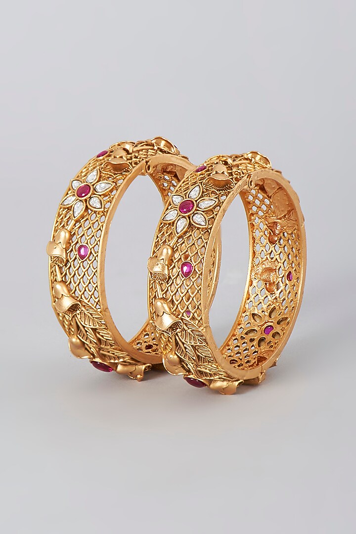 Gold Finish Kundan Polki & Synthetic Stone Bangles (Set Of 2) by VASTRAA Jewellery at Pernia's Pop Up Shop