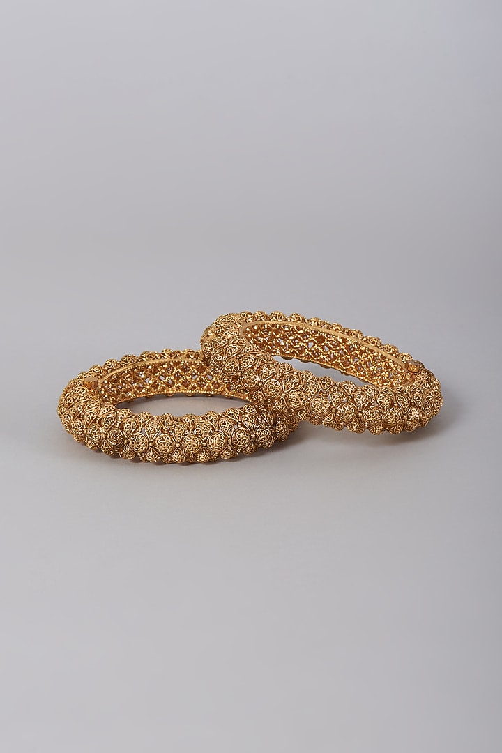 Gold Finish Carved Bangles (Set of 2) by VASTRAA Jewellery at Pernia's Pop Up Shop