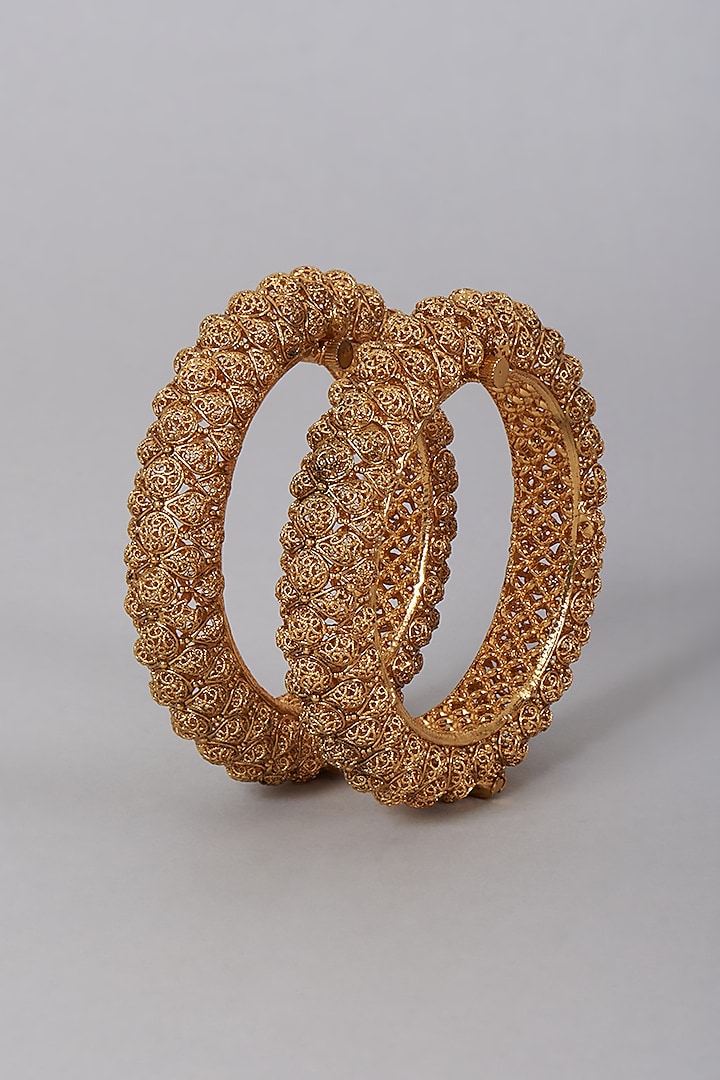 Gold Finish Carved Bangles (Set of 2) by VASTRAA Jewellery at Pernia's Pop Up Shop
