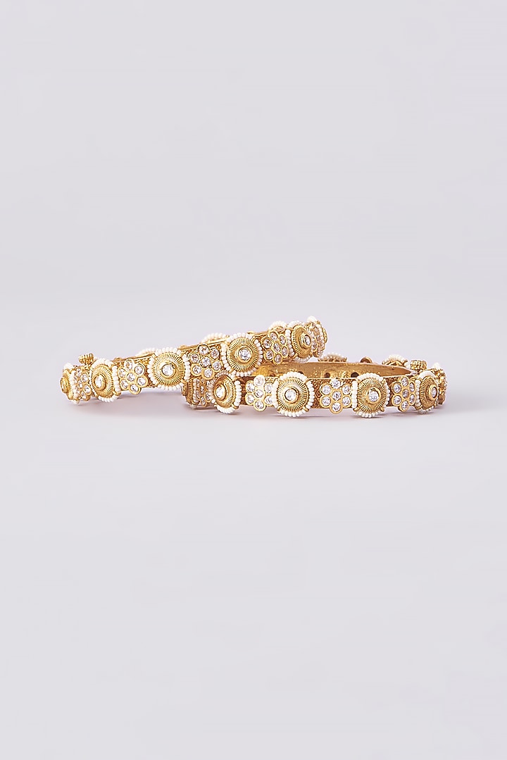 Gold Finish Kundan Polki Temple Bangles (Set Of 2) by VASTRAA Jewellery at Pernia's Pop Up Shop