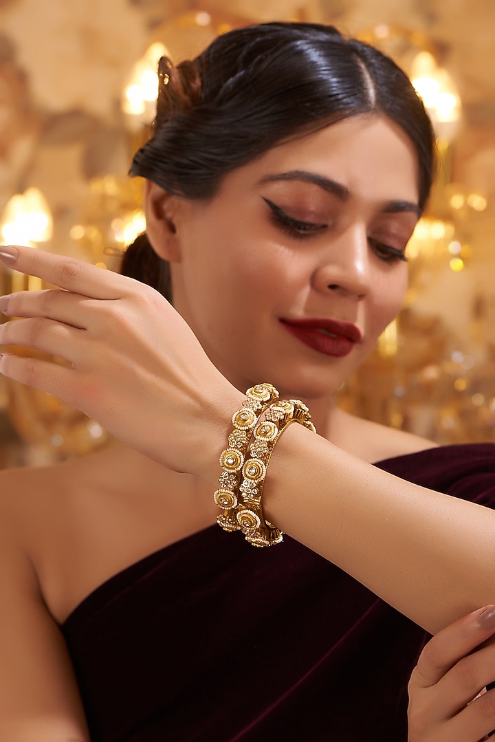Gold Finish Kundan Polki Temple Bangles (Set Of 2) by VASTRAA Jewellery at Pernia's Pop Up Shop