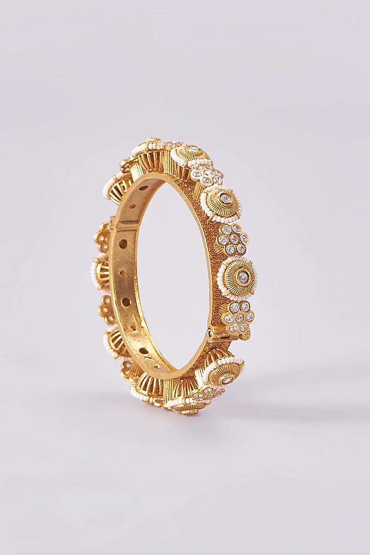 Gold Finish Kundan Polki Temple Bangles (Set Of 2) by VASTRAA Jewellery at Pernia's Pop Up Shop