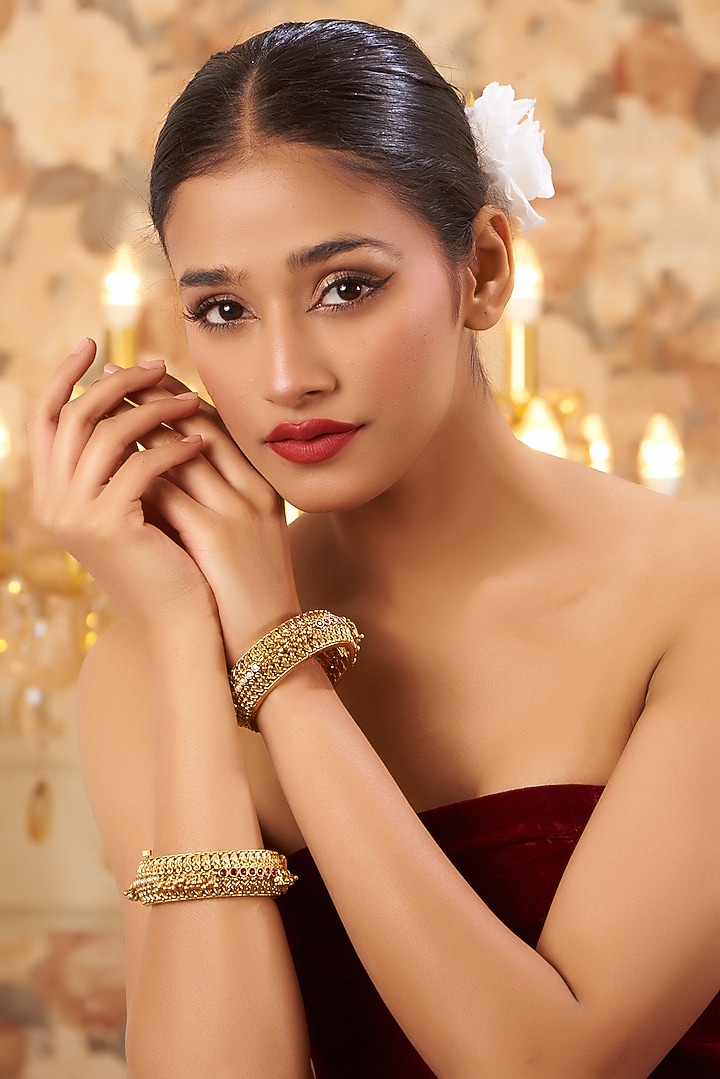 Gold Finish Kundan Polki Temple Bangles (Set Of 2) by VASTRAA Jewellery at Pernia's Pop Up Shop