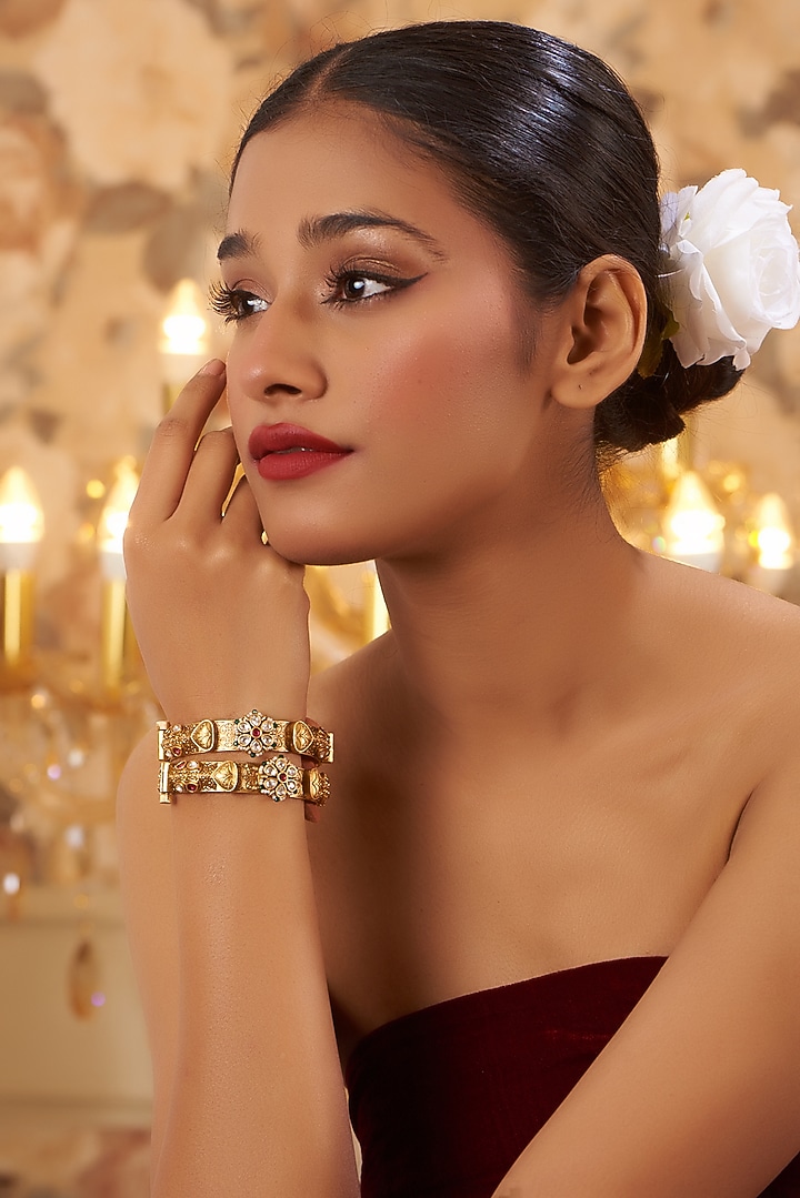 Gold Finish Kundan Polki Temple Bangles (Set Of 2) by VASTRAA Jewellery at Pernia's Pop Up Shop