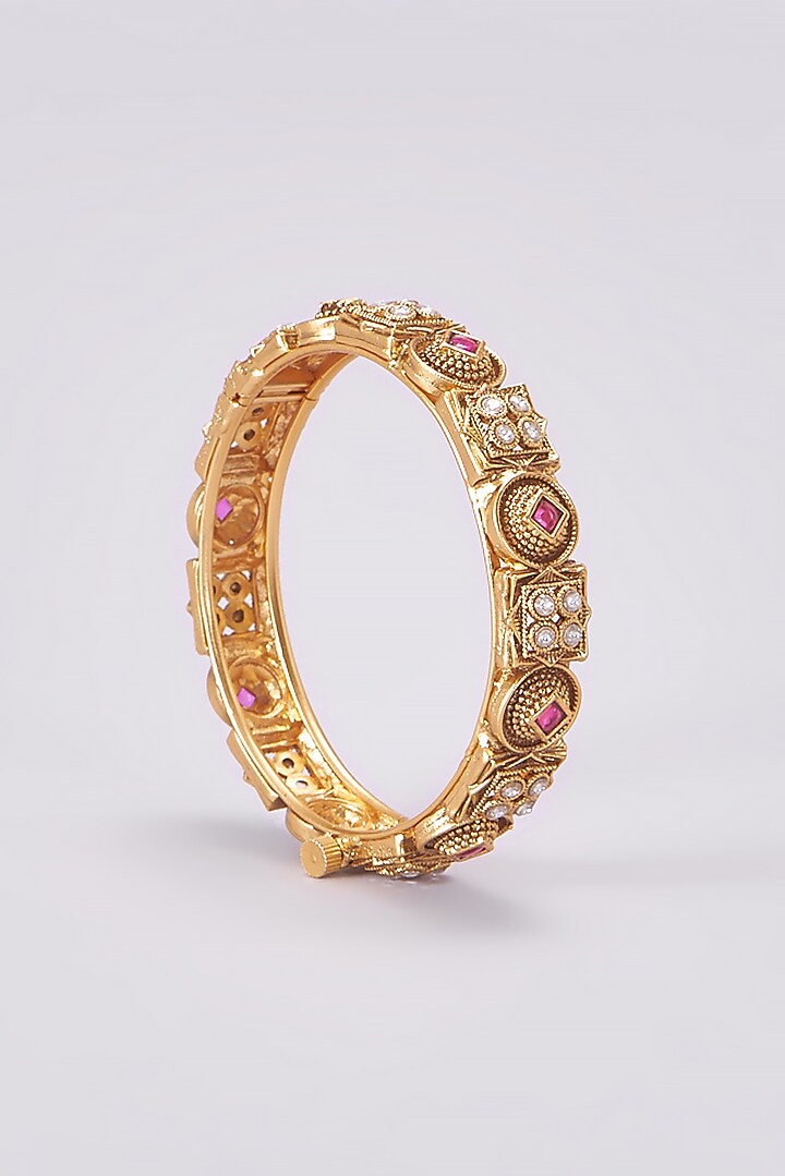 Gold Finish Kundan Polki Temple Bangles (Set Of 2) by VASTRAA Jewellery at Pernia's Pop Up Shop