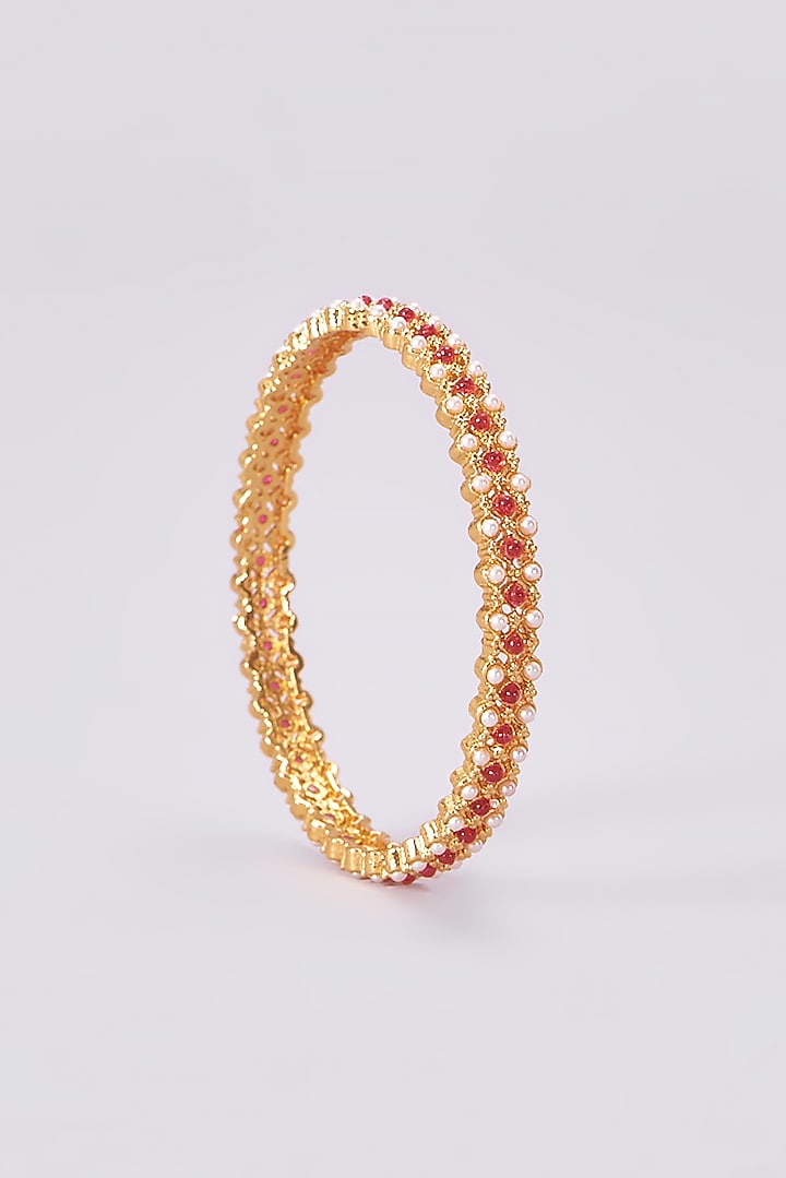 Gold Finish Kundan Polki Temple Bangles (Set Of 4) by VASTRAA Jewellery at Pernia's Pop Up Shop