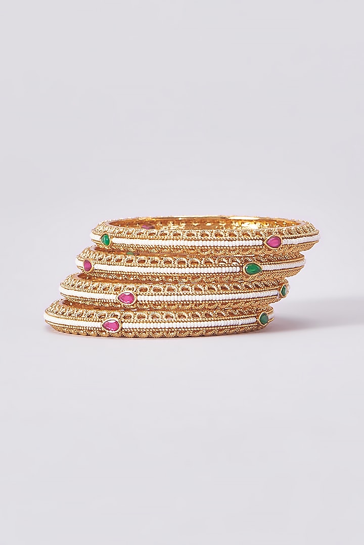 Gold Finish Kundan Polki Temple Bangles (Set Of 4) by VASTRAA Jewellery at Pernia's Pop Up Shop