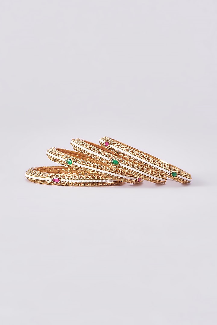 Gold Finish Kundan Polki Temple Bangles (Set Of 4) by VASTRAA Jewellery at Pernia's Pop Up Shop