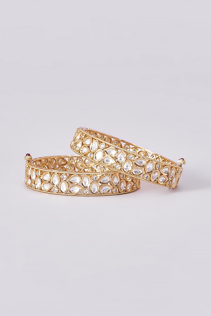 Gold Finish Kundan Polki Bangles (Set Of 2) by VASTRAA Jewellery at Pernia's Pop Up Shop