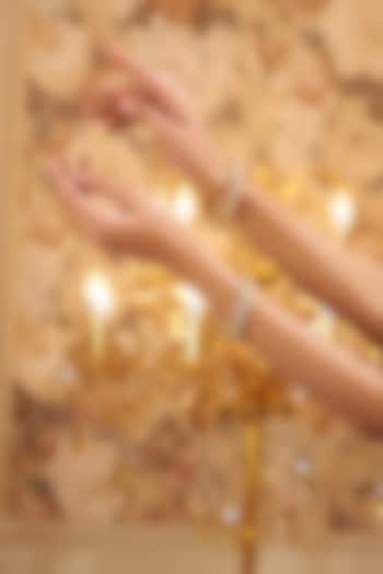 Gold Finish Kundan Polki Bangles (Set Of 2) by VASTRAA Jewellery at Pernia's Pop Up Shop