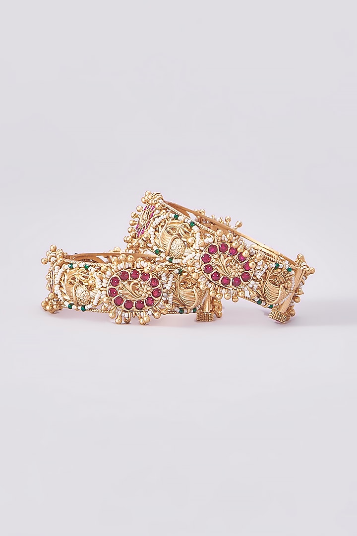 Gold Finish Kundan Polki Temple Bangles (Set Of 2) by VASTRAA Jewellery at Pernia's Pop Up Shop