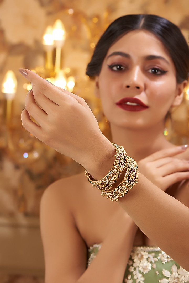 Gold Finish Kundan Polki Temple Bangles (Set Of 2) by VASTRAA Jewellery at Pernia's Pop Up Shop