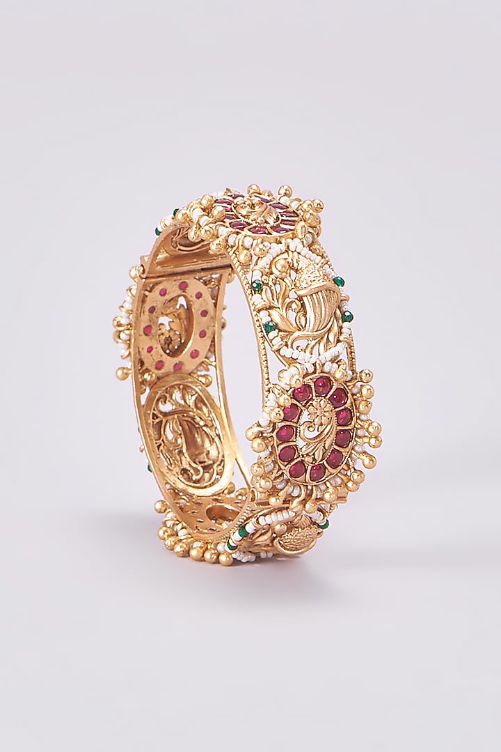 Gold Finish Kundan Polki Temple Bangles (Set Of 2) by VASTRAA Jewellery at Pernia's Pop Up Shop