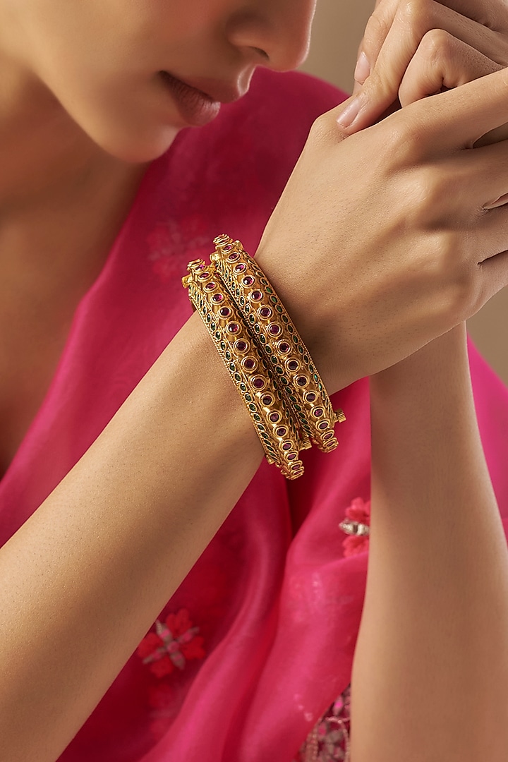 Gold Finish Kundan Polki & Multi-Colored Stone Bangles (Set Of 2) by VASTRAA Jewellery