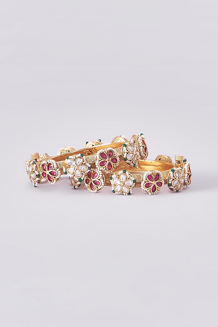 Gold Finish Kundan Polki Temple Bangles (Set Of 2) by VASTRAA Jewellery at Pernia's Pop Up Shop