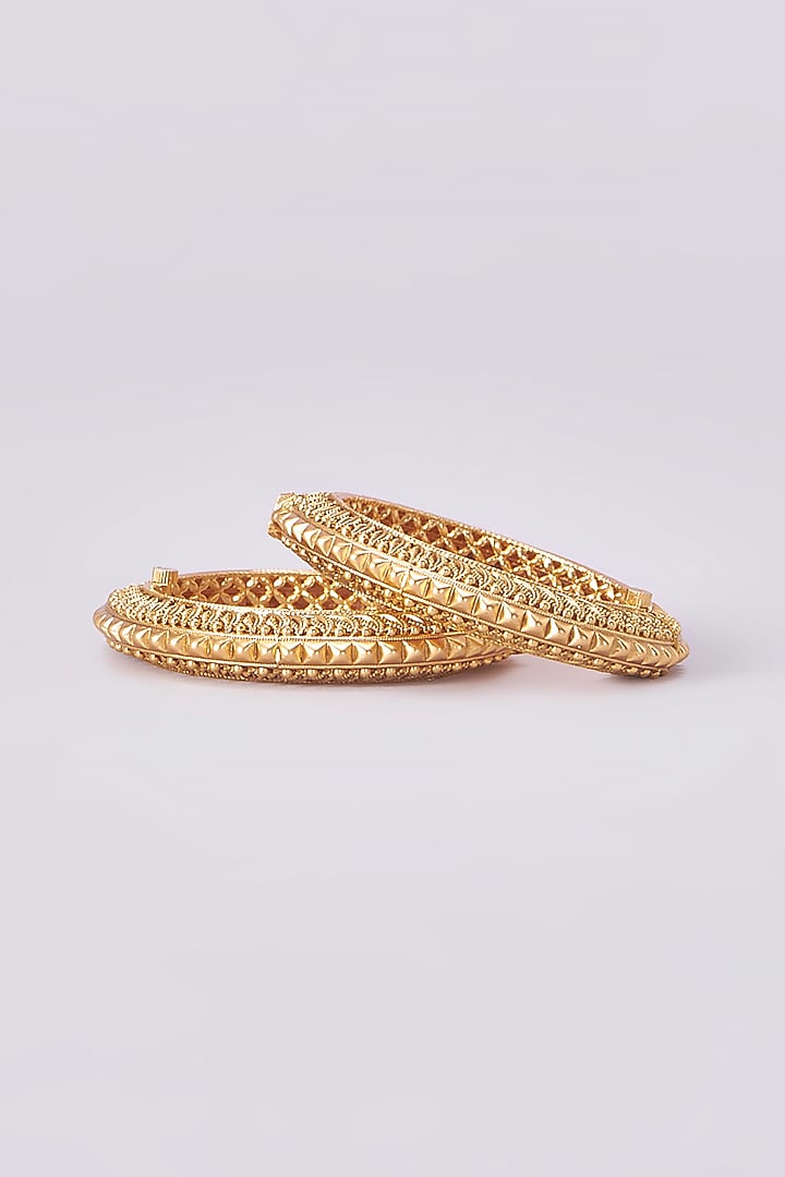 Gold Finish Kundan Polki Temple Bangles (Set Of 2) by VASTRAA Jewellery at Pernia's Pop Up Shop
