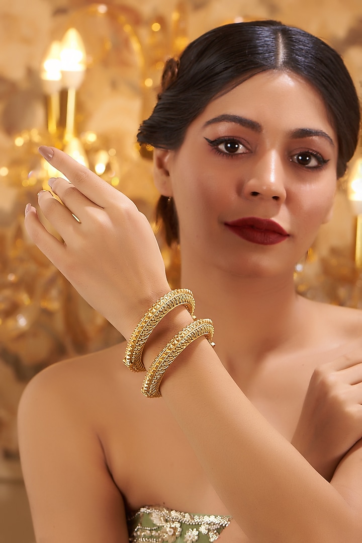 Gold Finish Kundan Polki Temple Bangles (Set Of 2) by VASTRAA Jewellery at Pernia's Pop Up Shop