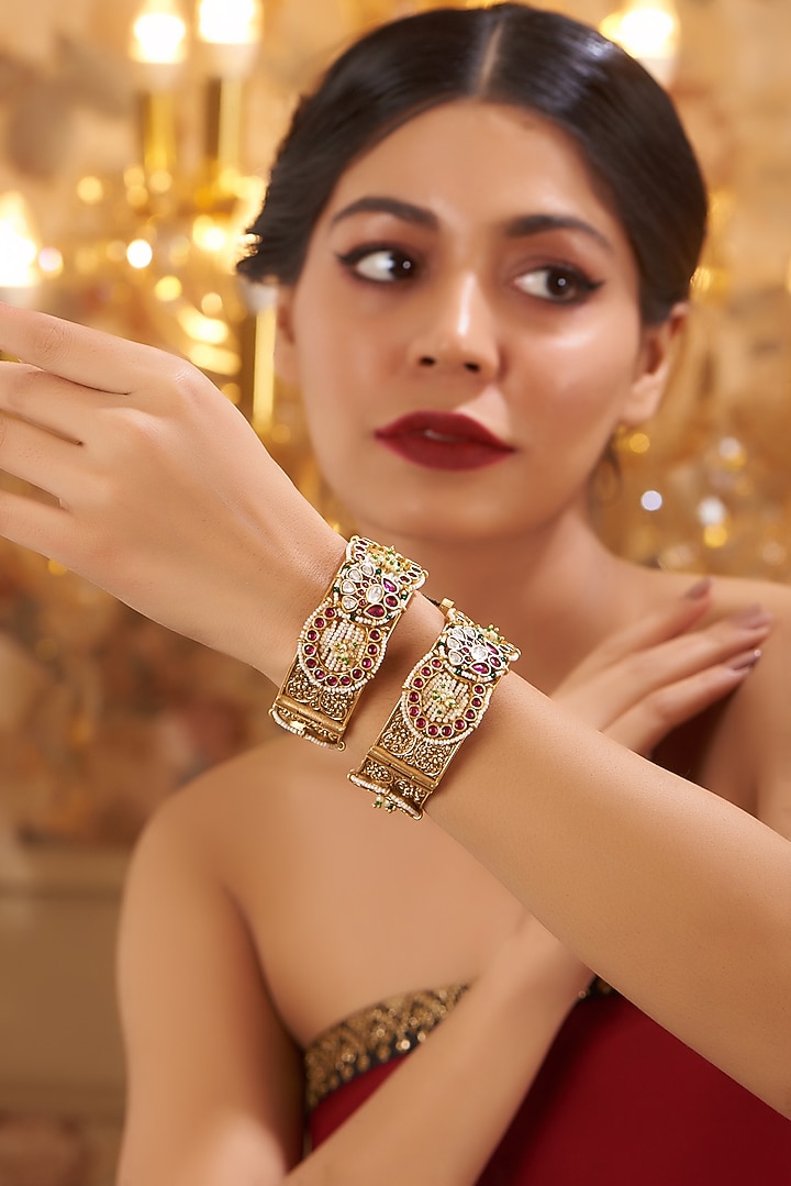 Gold Finish Kundan Polki Temple Bangles (Set Of 2) by VASTRAA Jewellery at Pernia's Pop Up Shop